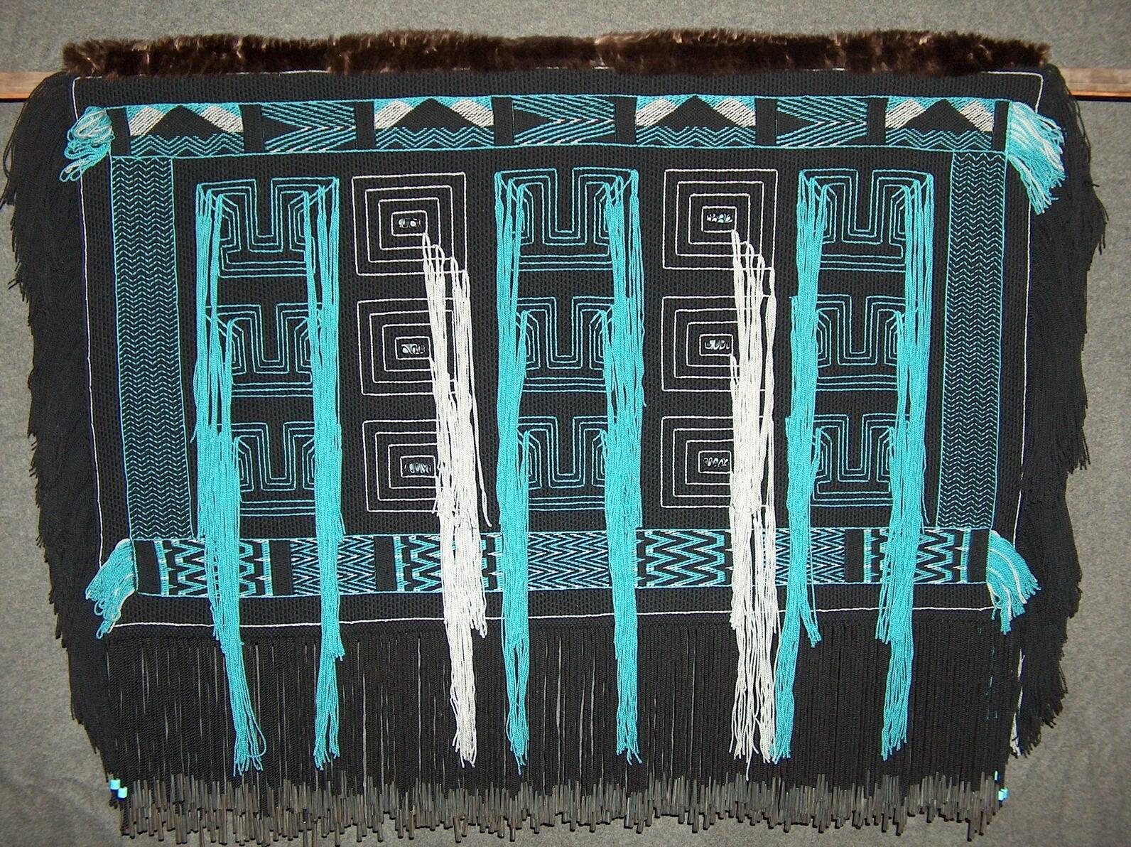 Chilkat woven robe of black, white, gray, and blue